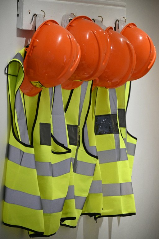 The Risk You Can't See: Why Safety Guarding Under Overhead Rail Bags Is Critical
